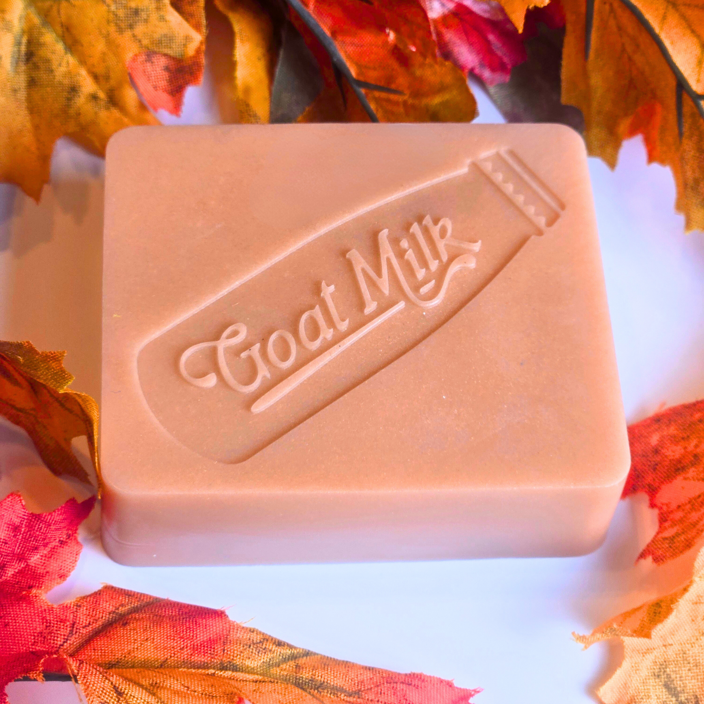 Rustic handcrafted soap bar with pumpkin pie aroma and creamy texture, front view.