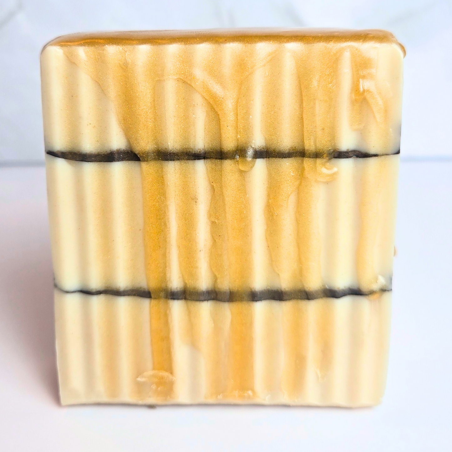 Gourmet- inspired handmade soap bar that looks like real maple french toast, front view.