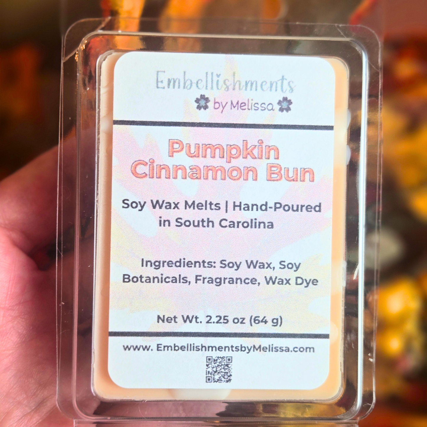 Soy wax melt cubes with rich pumpkin cinnamon scent for autumn home fragrance, front view.
