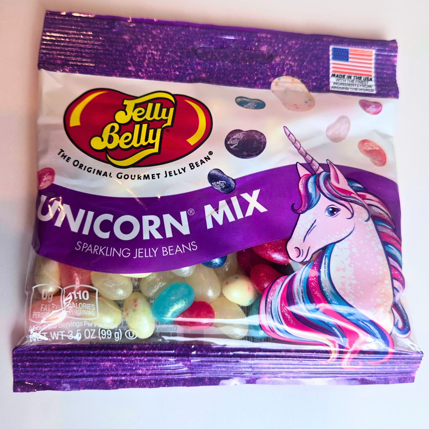 Unicorn-themed rainbow candy pieces included in gift box—sweet, magical treat to complete the experience