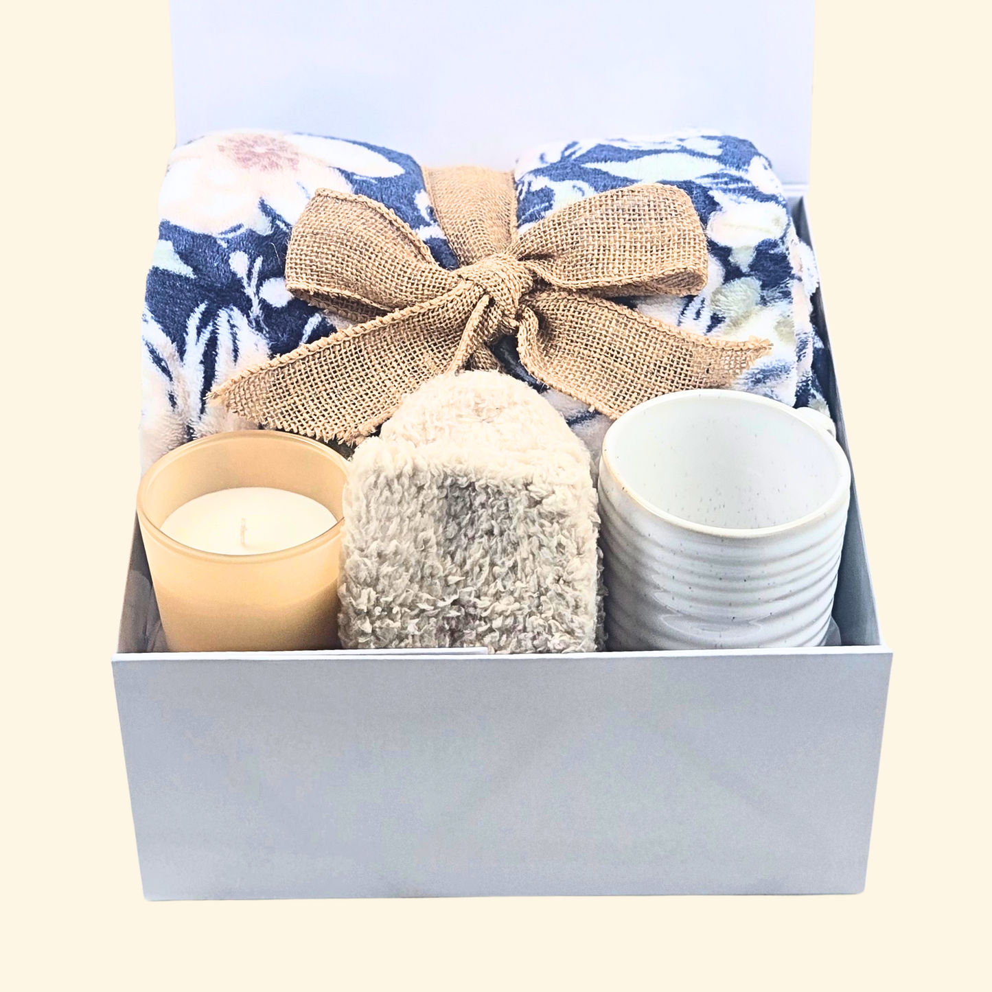 Cozy Gift Box with Flowered Fleece Blanket (Wrapped in Burlap Bow), Mug, Fuzzy Socks & Vanilla Candle