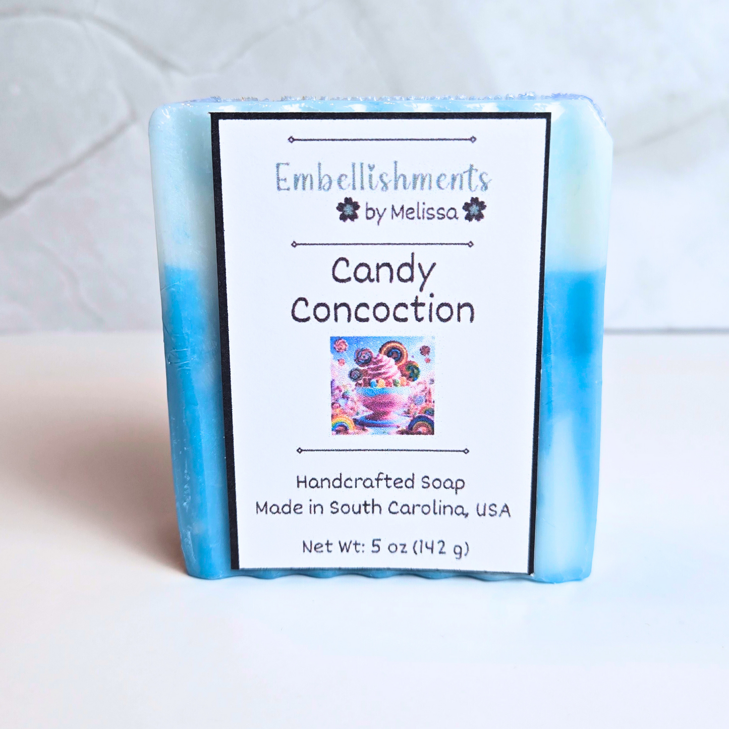 Blue and white swirled soap with a sweet, nostalgic candy scent, front view.