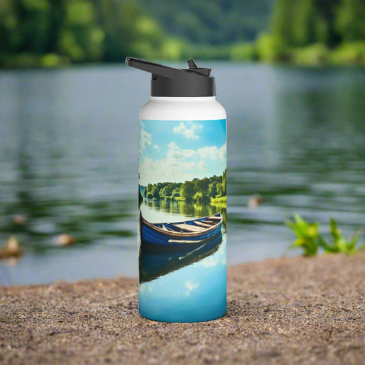 Lake life tumbler for outdoor enthusiasts with canoes, front view.