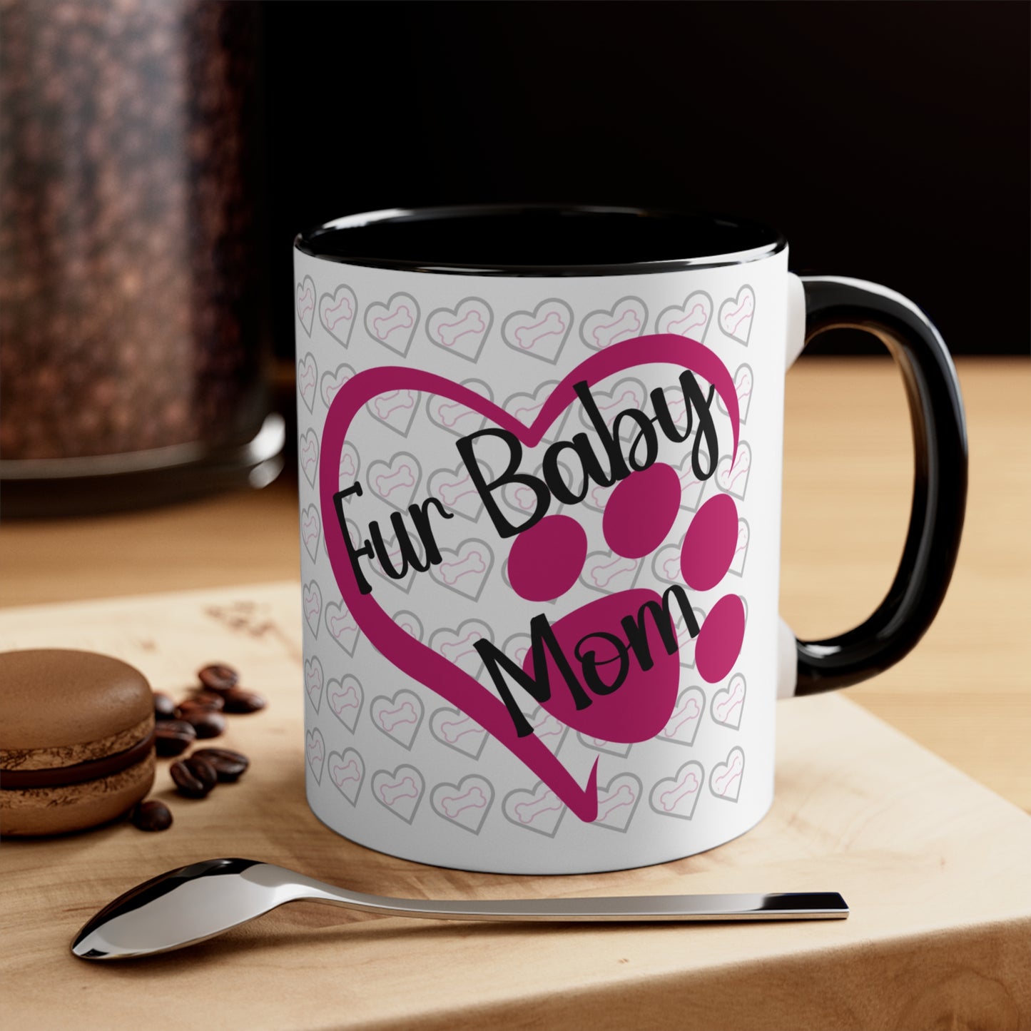 Fur baby mom coffee mug with pink heart and paw print 11 oz, front view in black.
