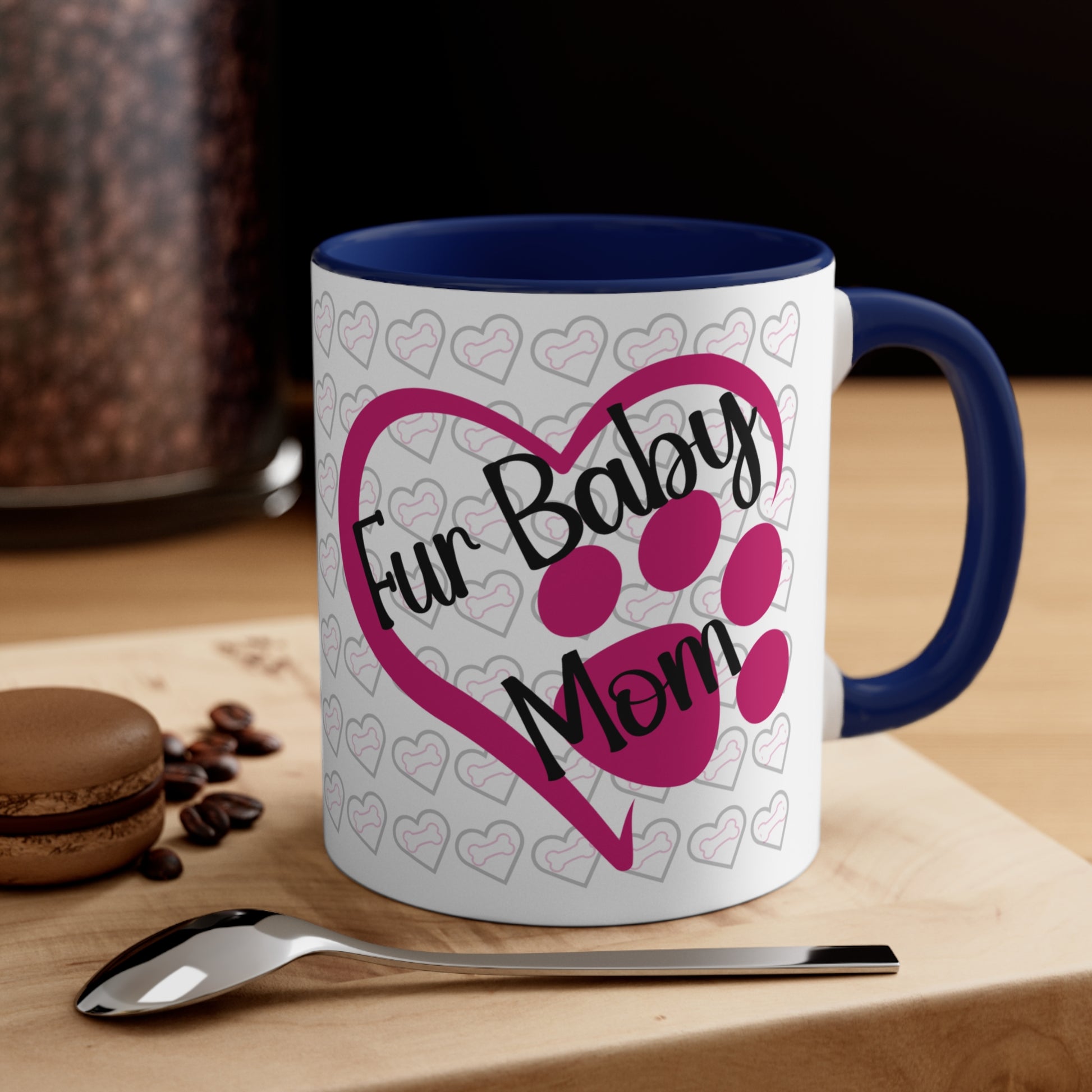 Fur baby mom coffee mug with pink heart and paw print 11 oz, front view in dark blue.
