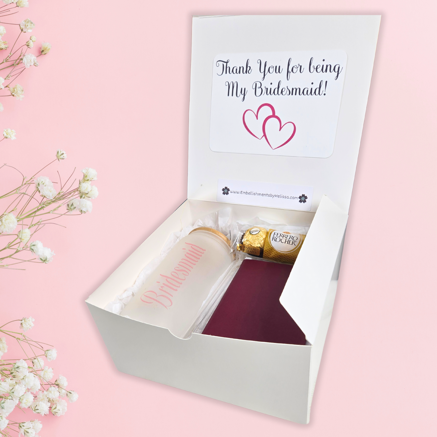 Bridesmaid gift box including glass can, notebook with pen and chocolates.