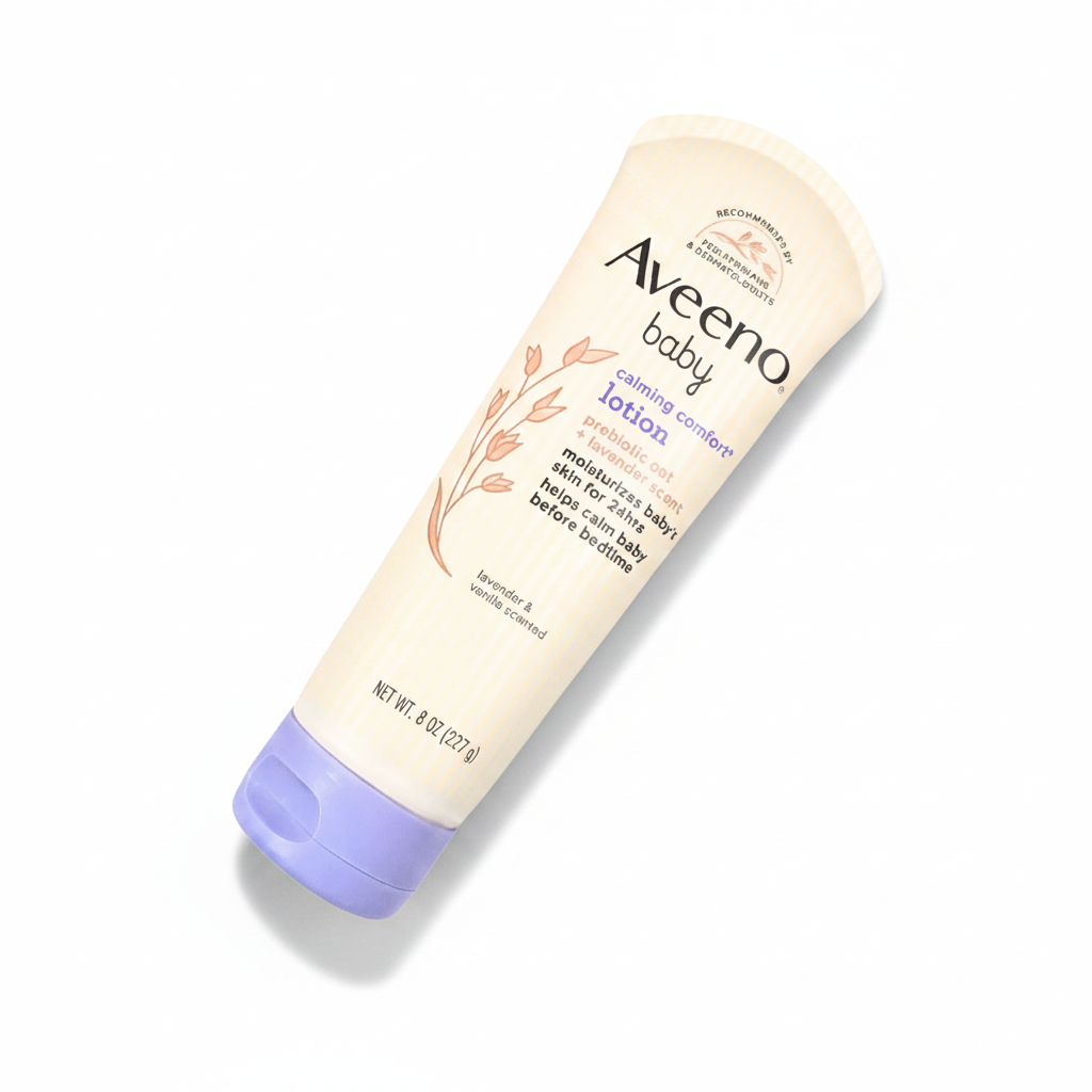 Aveeno Baby Cleansing Comfort Lotion in a 8 oz tube, featuring a warm cream-colored body with a lavender purple cap, shown on a white background with a soft shadow.