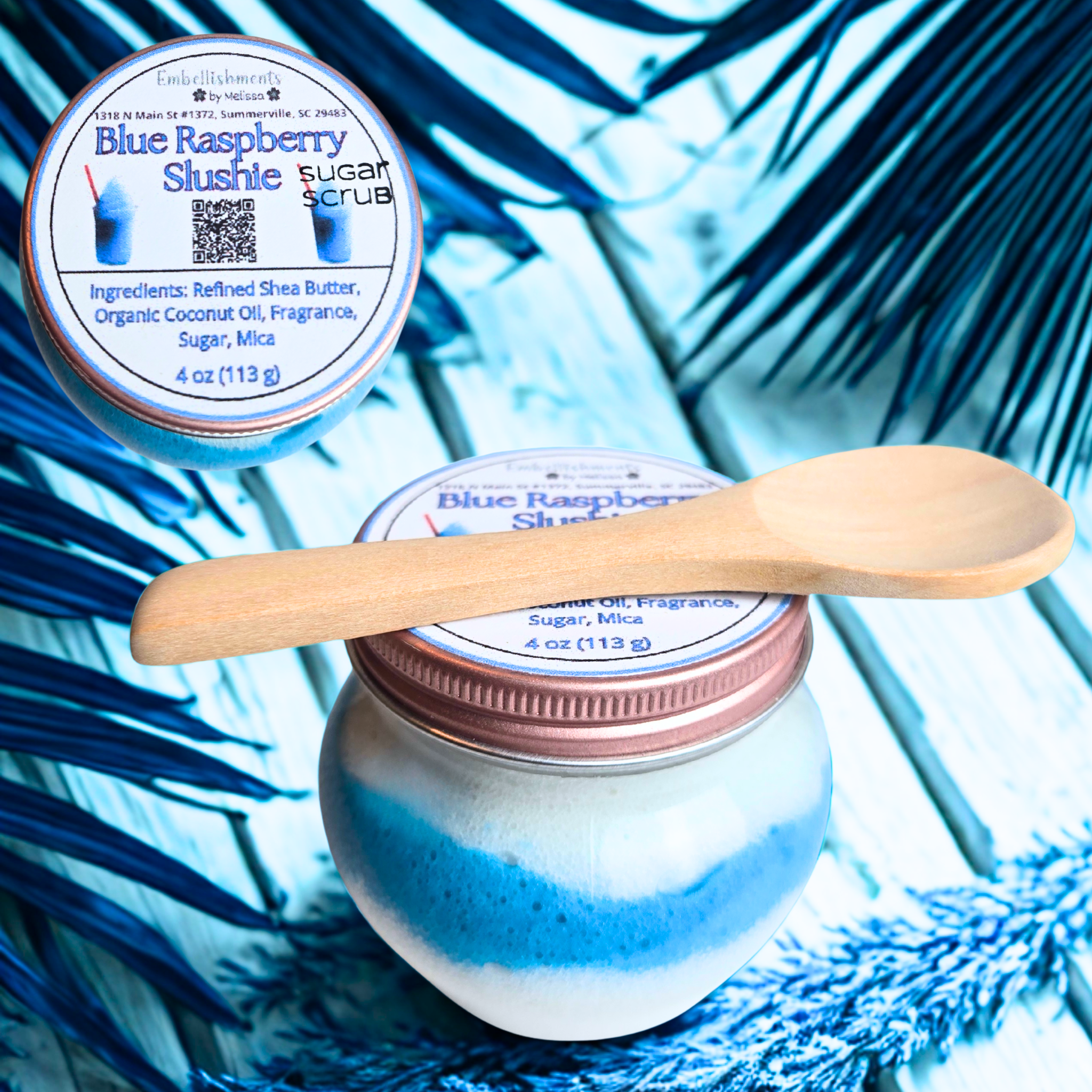 Jar of bright blue Blue Raspberry Slushie Whipped Sugar Scrub with a soft, fluffy texture, made with coconut oil and shea butter
