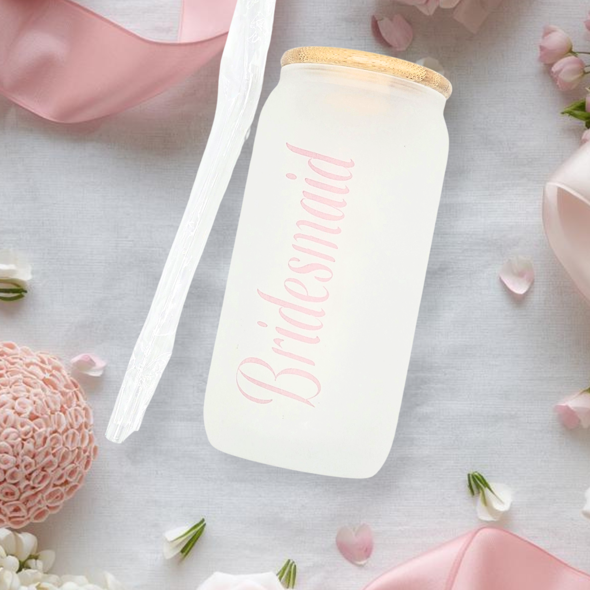 White bottle with Bridesmaid text on a light gray background with floral decorations