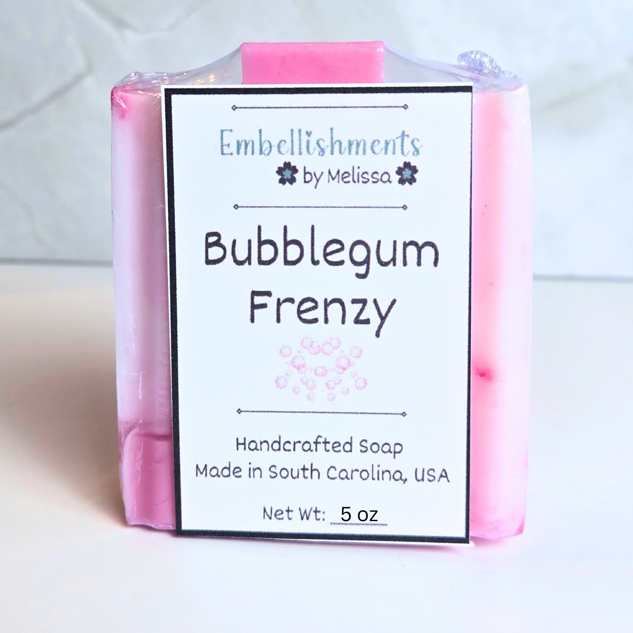 Cute pink soap with bubblegum fragrance, ideal for gifts, front view.