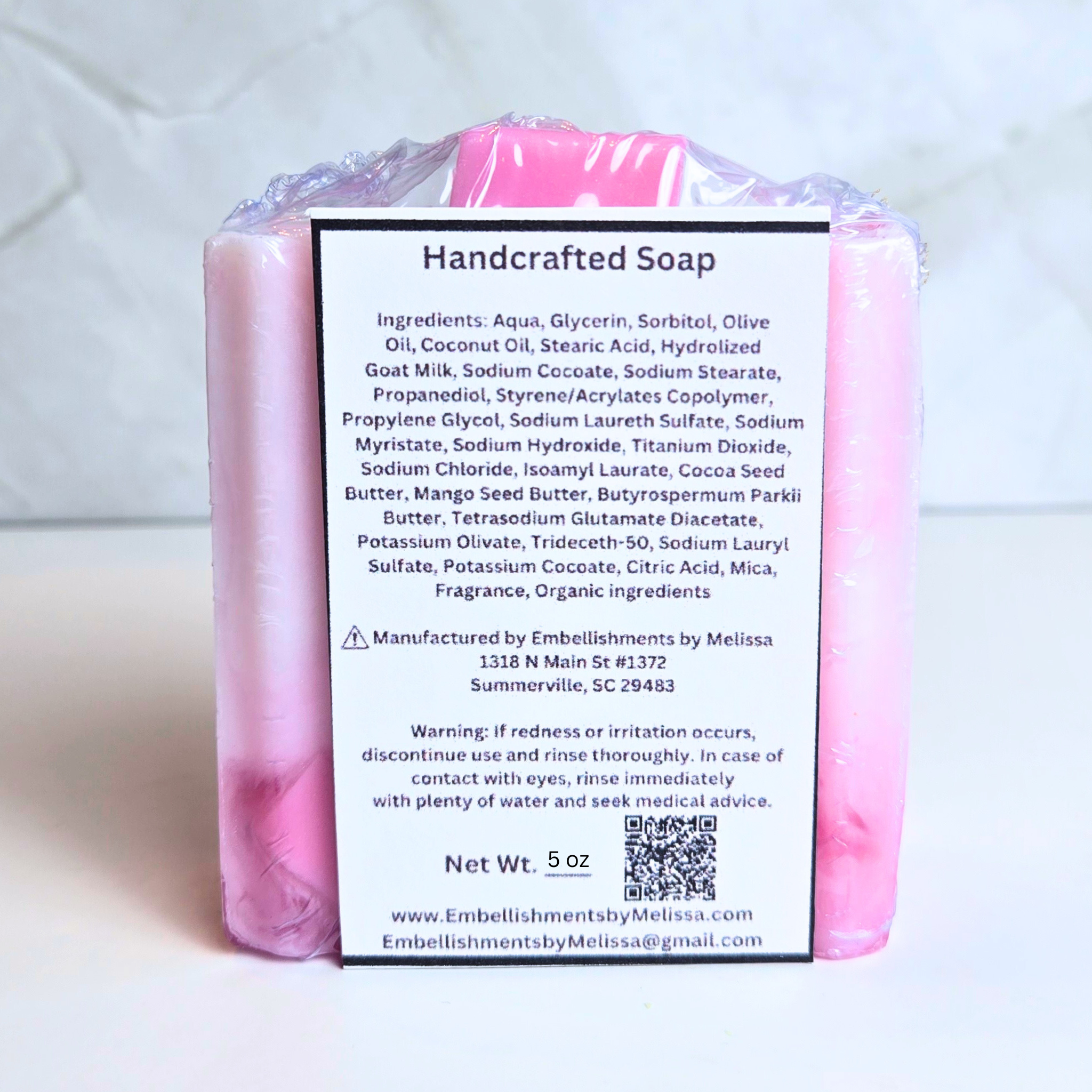 Pink artisan soap infused with bubblegum essence.