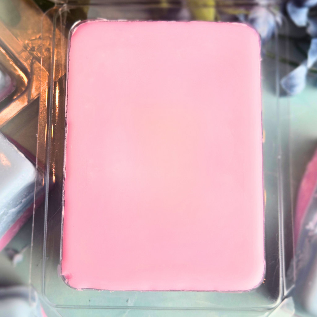 Colorful soy wax melts designed to smell like classic carnival cotton candy.