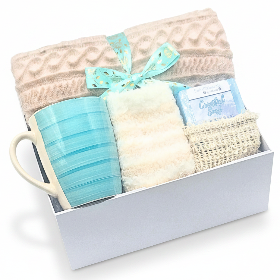 Teal gift set with a mug, blanket, and and handcrafted soap in a box.