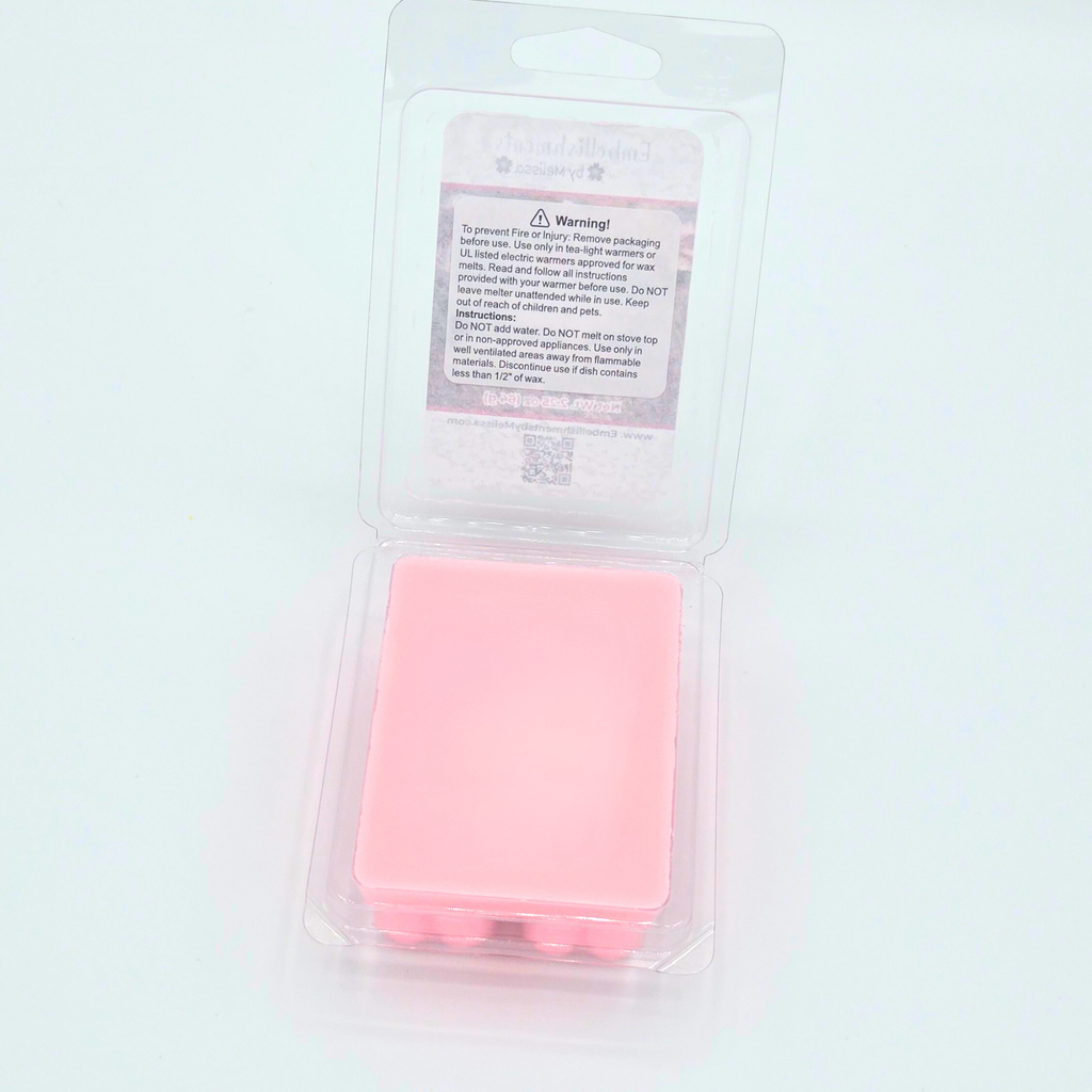 Pink square object in clear packaging on a white background