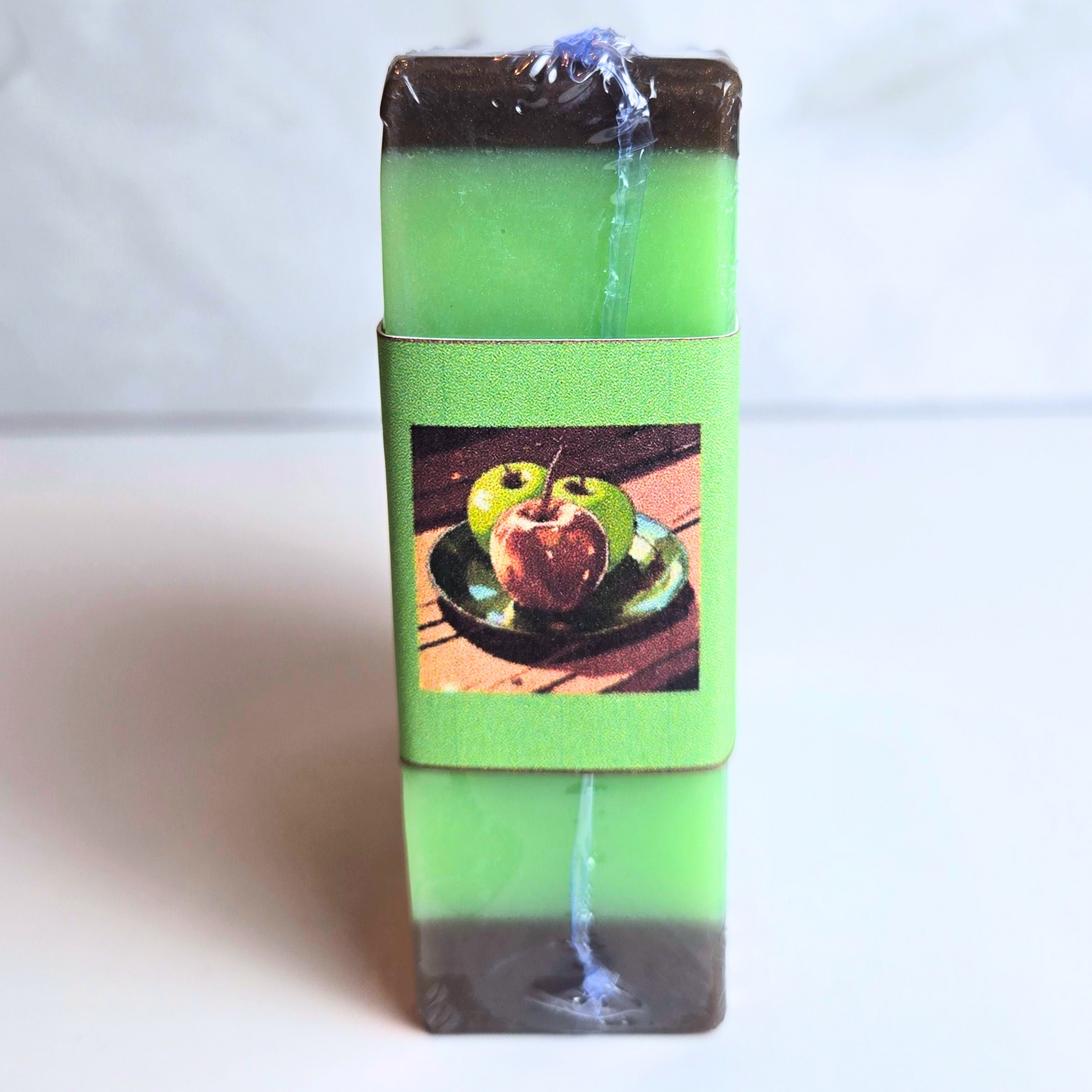 Fall-inspired soap bar with the scent of crisp apples and caramel, side view.
