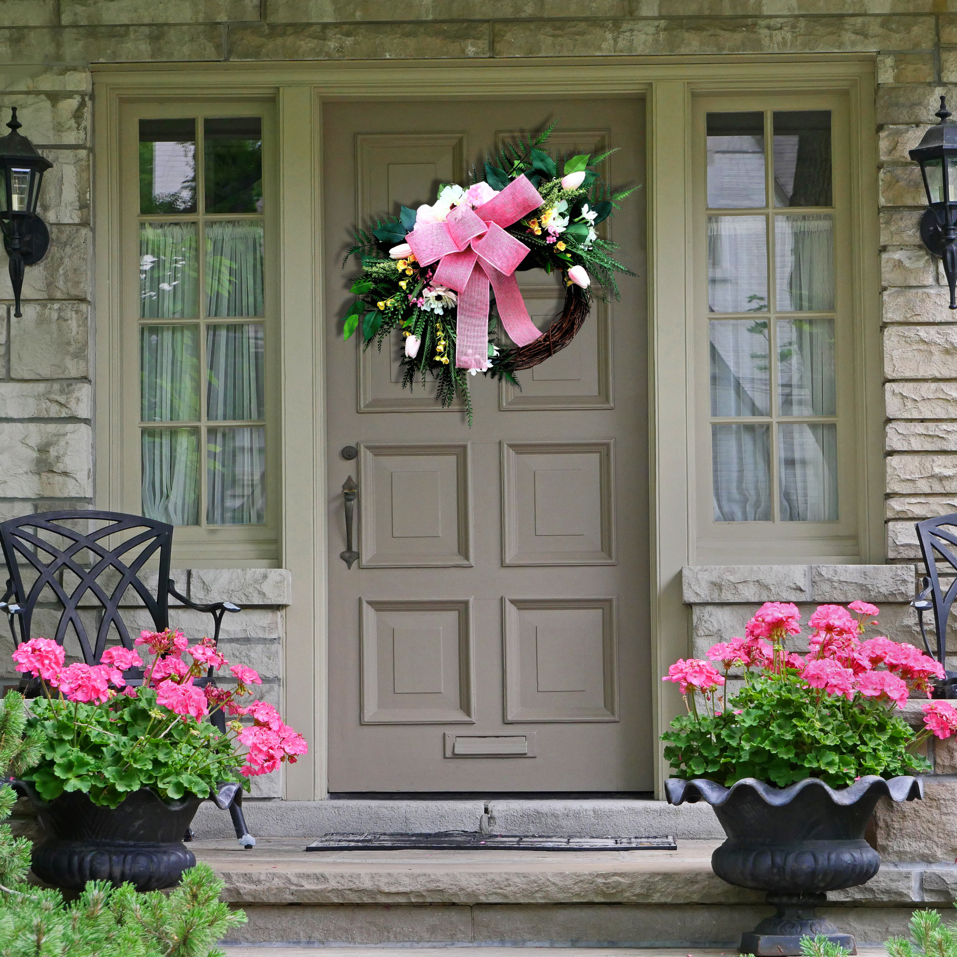 Farmhouse Style Year-Round Faux Floral Wreath with Pink Bow, front view.