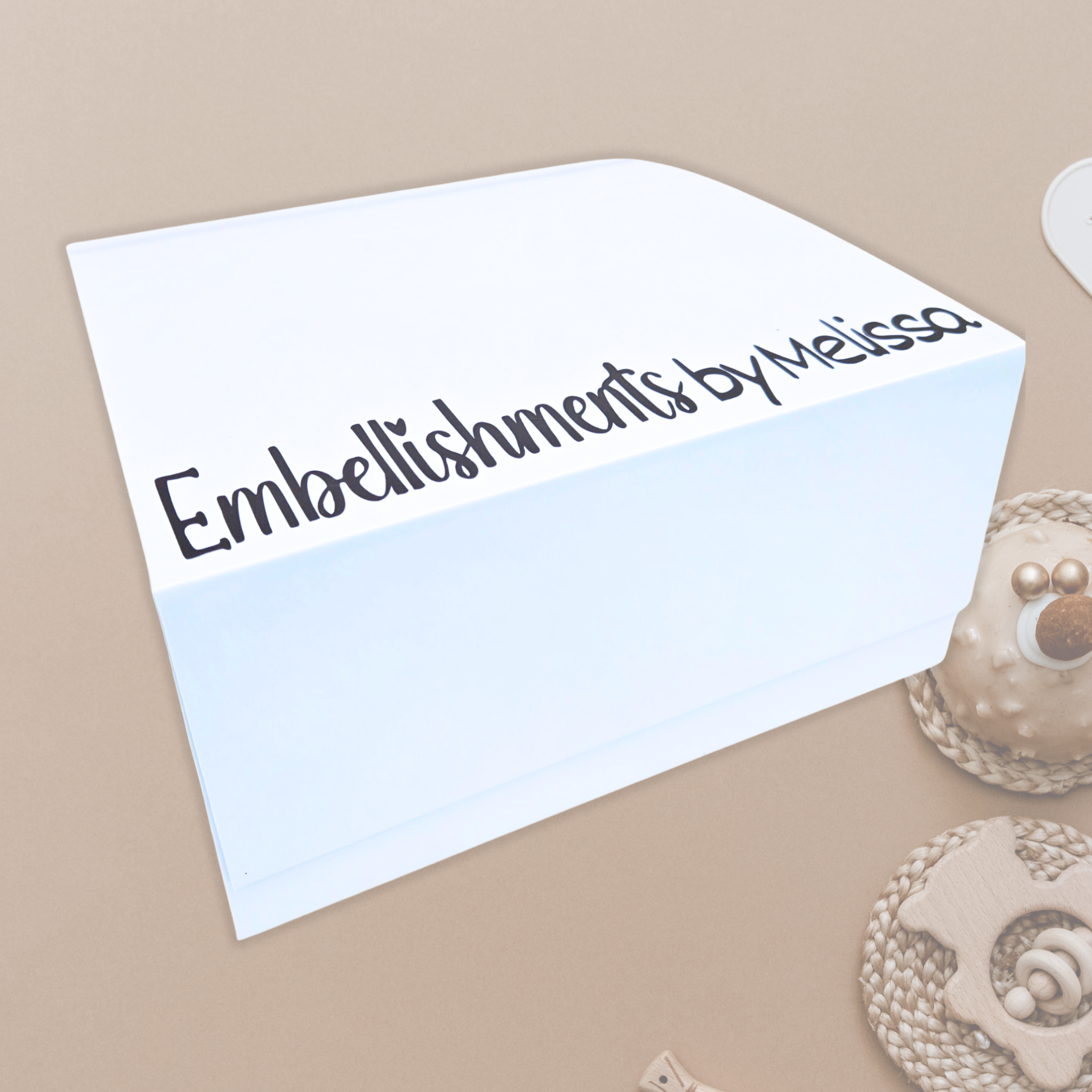 Baby shower gift box in neutral colors.
