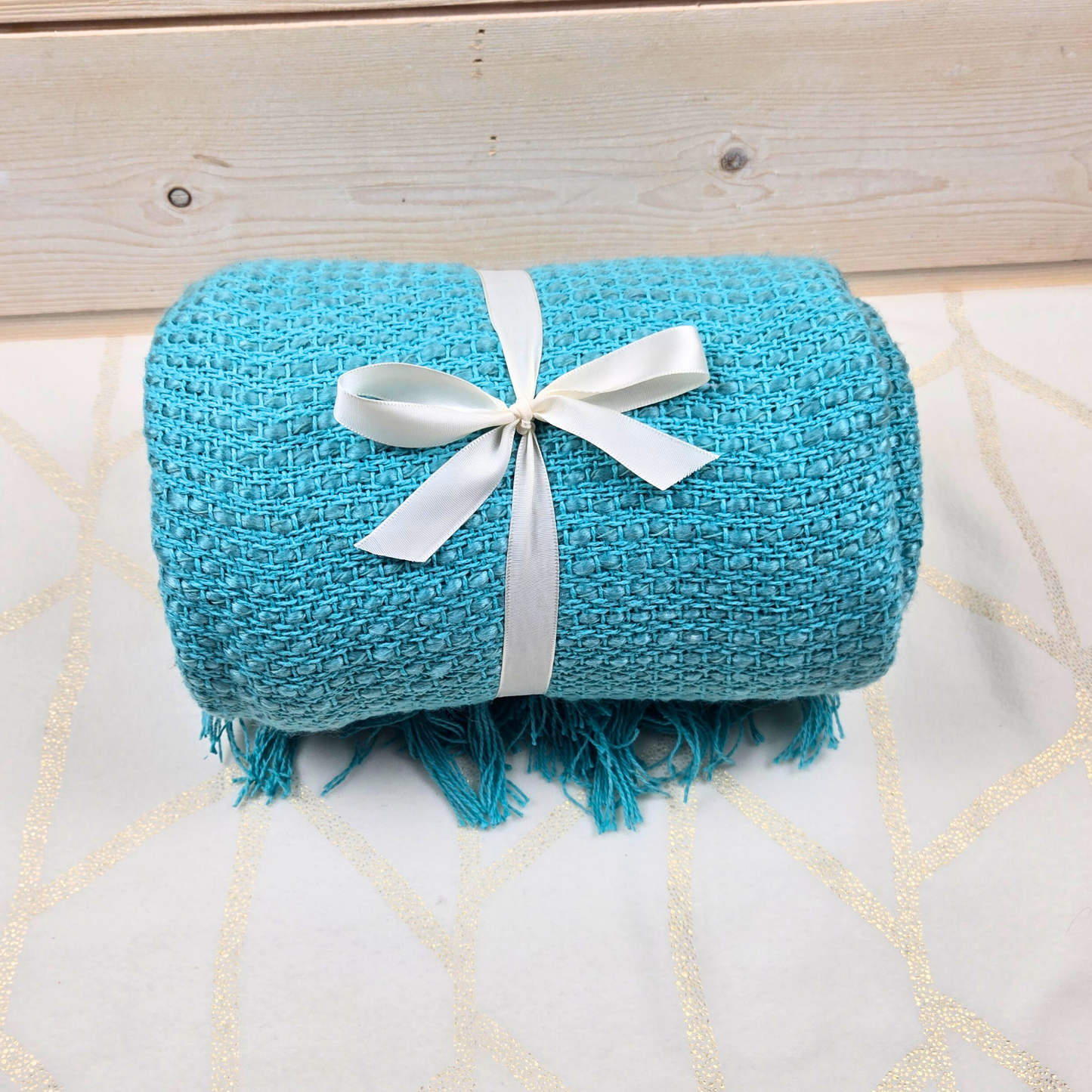 Teal throw for boho gift box for her.