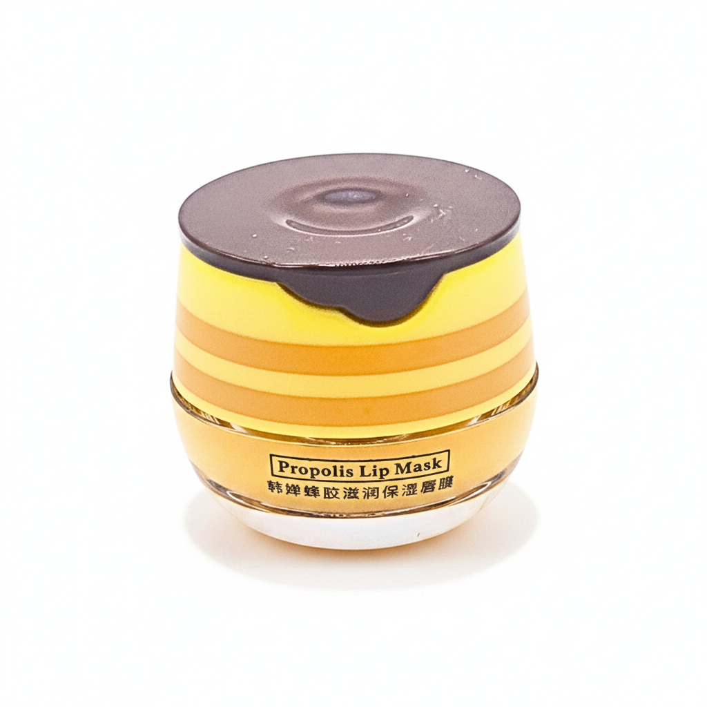 A jar of Propolis Lip Mask cream with a yellow and orange striped design, a dark brown lid, and a white base, shown on a plain white background.