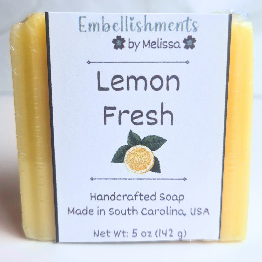 Citrusy lemon-scented handmade soap in vibrant yellow color, front view.