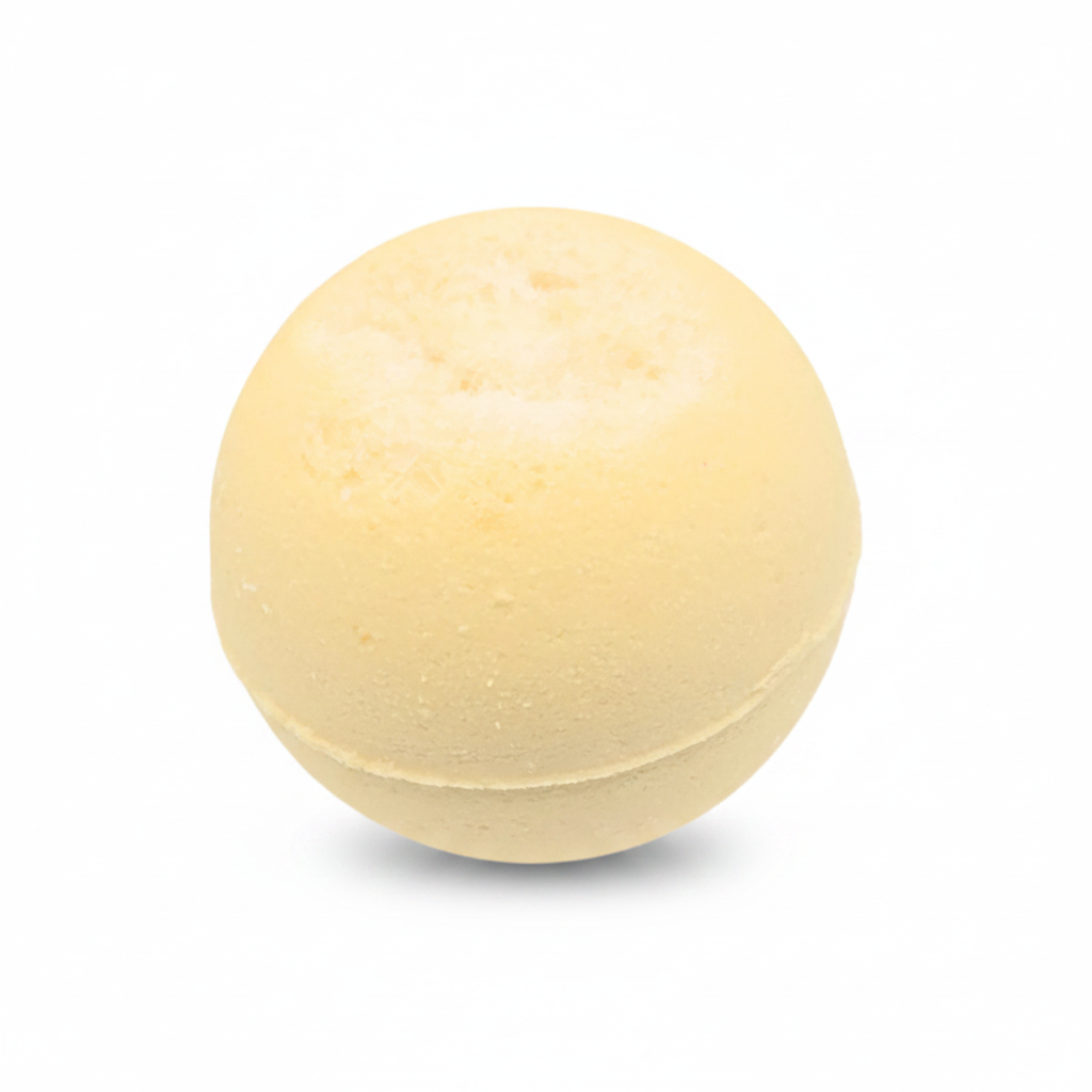 A single pale yellow bath bomb with a textured, porous surface, isolated on a solid white background.