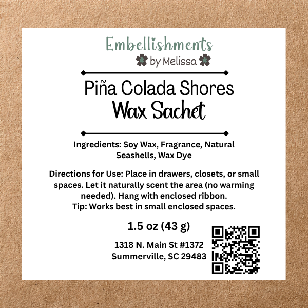 A white rectangular label for 'Piña Colada Shores Wax Sachet' by Embellishments by Melissa, displayed on a brown kraft paper background. The label details the scent ingredients, usage directions, address, and weight, and includes a QR code.