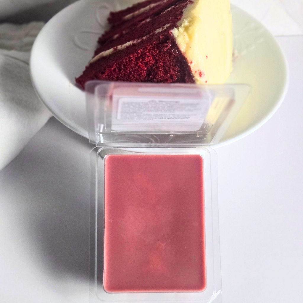Open clamshell with burgundy red velvet cake soy wax melts.
