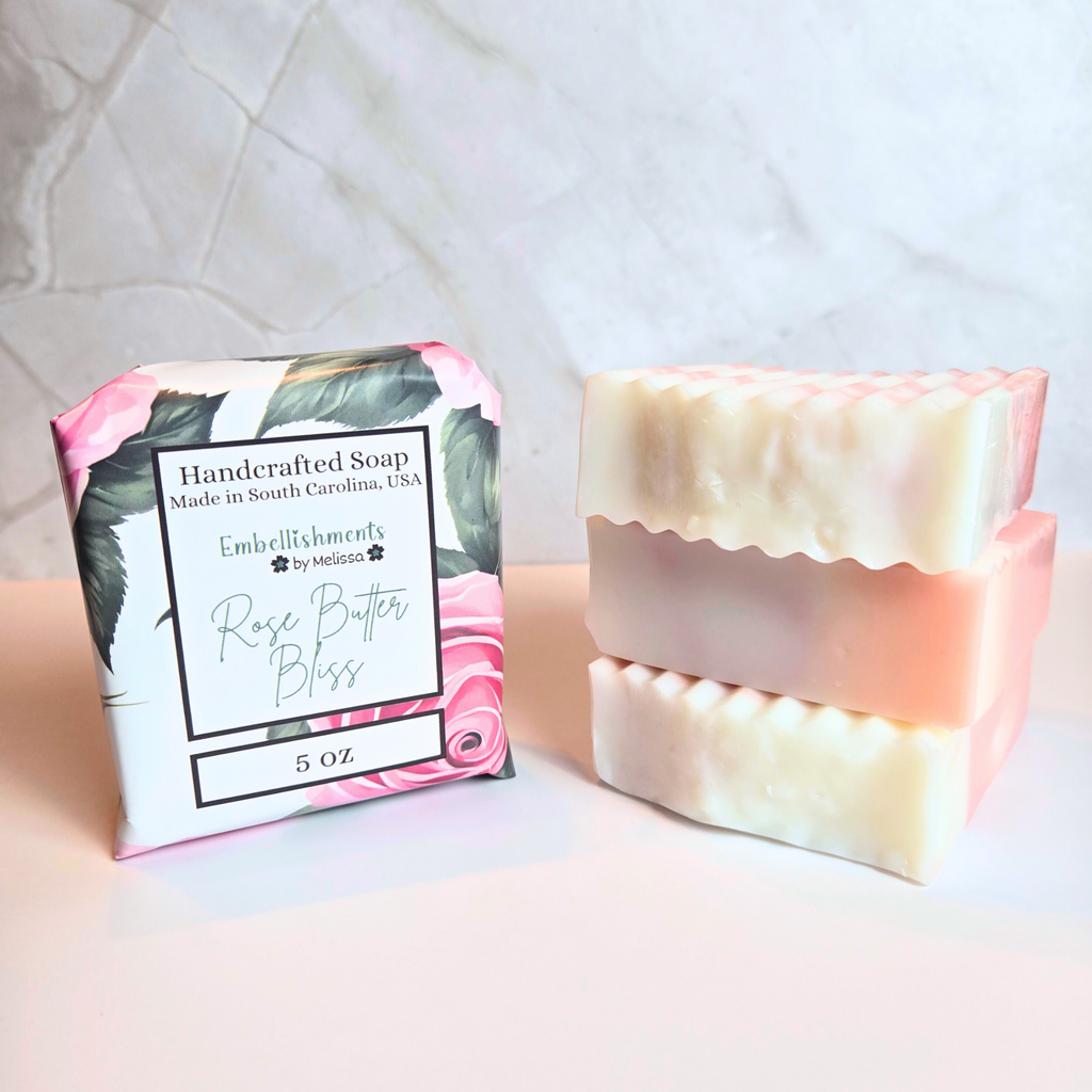 Handcrafted rose butter bliss soap bar with floral rose design, front view.