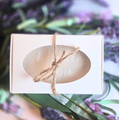 Rustic wedding favor soap bar infused with lavender and kaolin clay, top view.