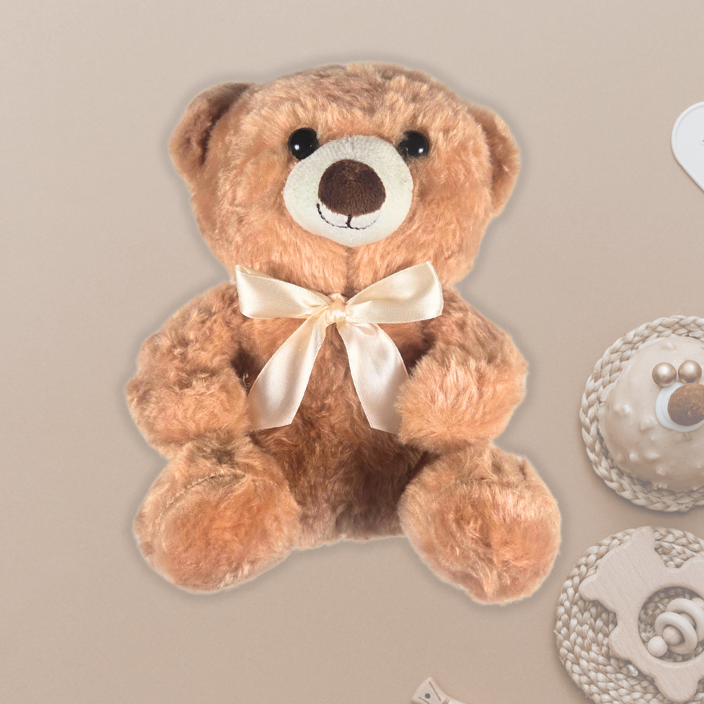 Stuffed bear with beige bow for boy or girl.