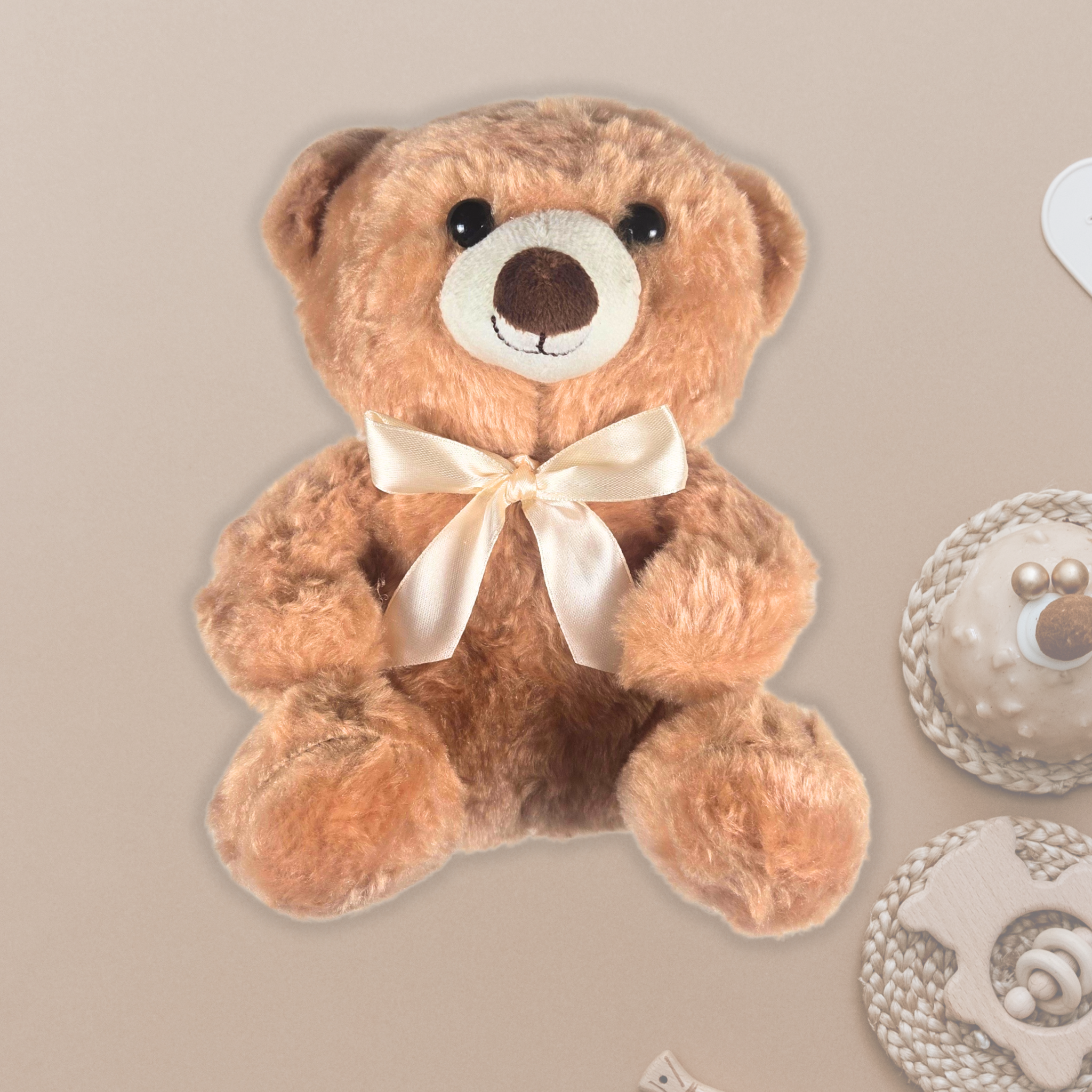 Stuffed bear with beige bow for boy or girl.