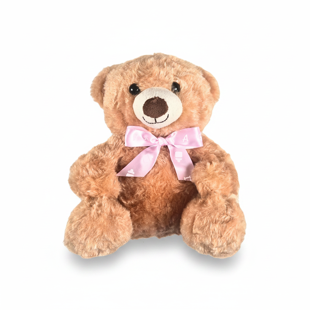 A brown plush teddy bear with a light pink ribbon bow around its neck, set against a plain white background.
