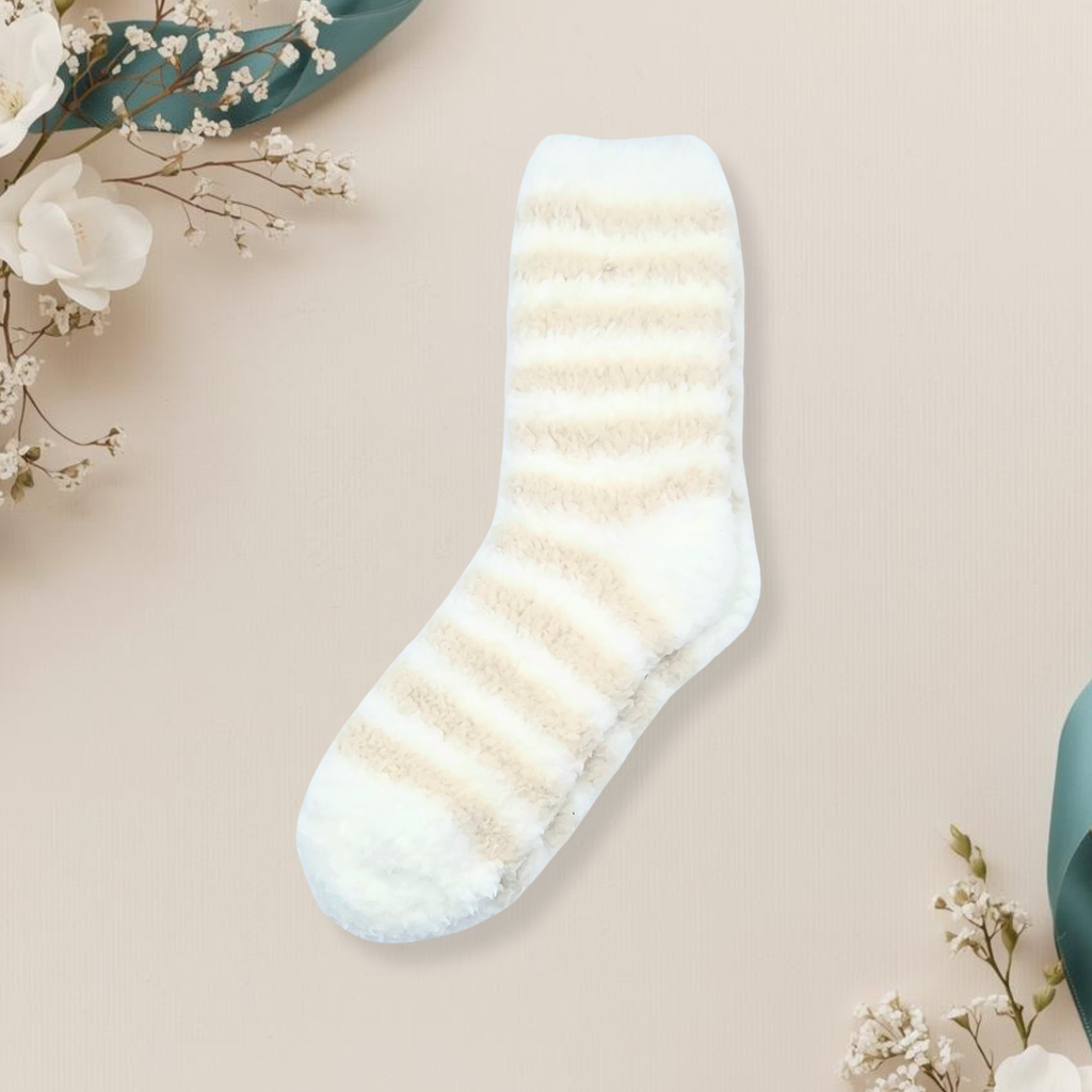 Striped sock on a beige background with floral decorations