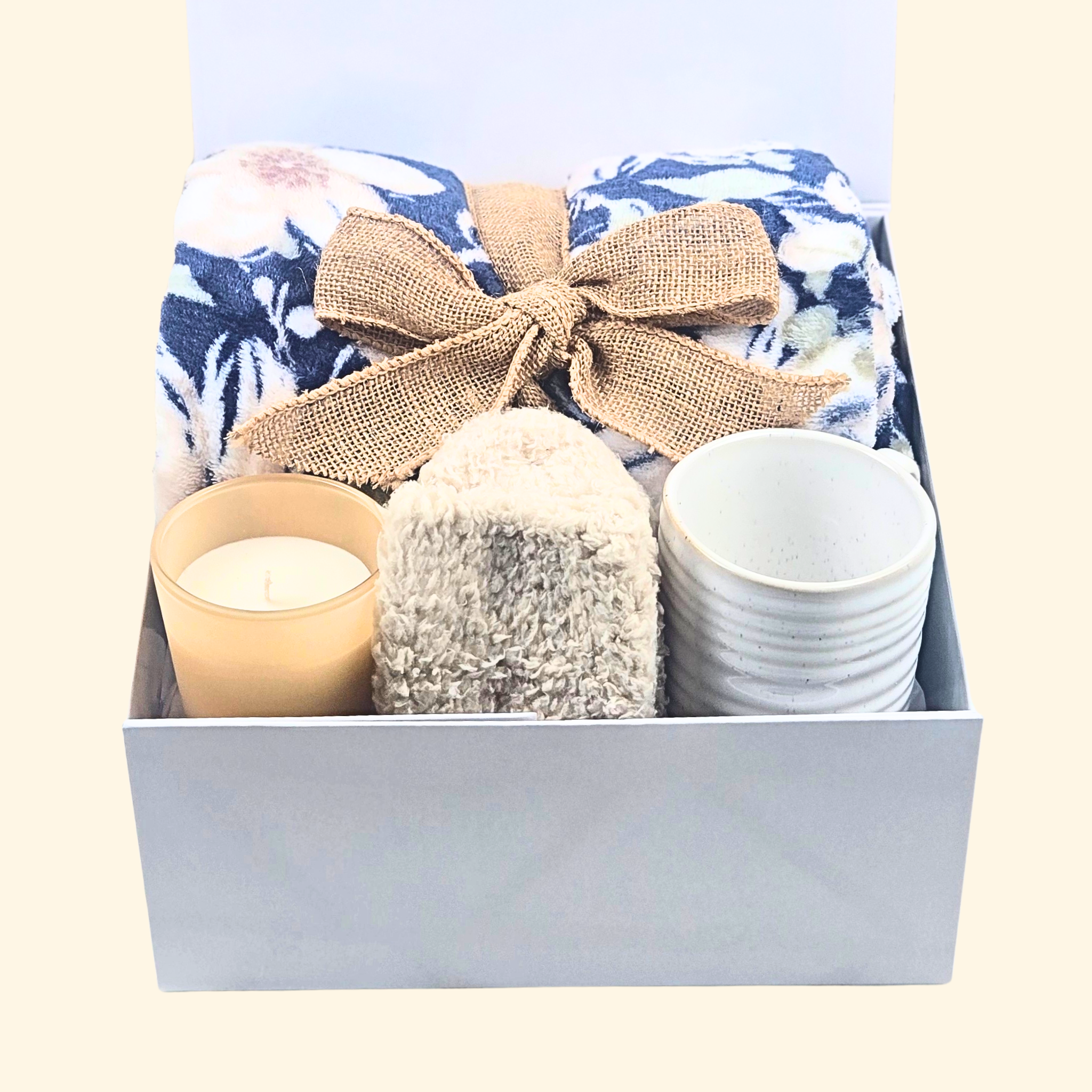 Cozy Gift Box with Flowered Fleece Blanket (Wrapped in Burlap Bow), Mug, Fuzzy Socks & Vanilla Candle