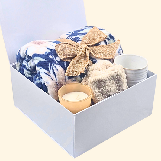 Cozy Gift Box with Flowered Fleece Blanket (Wrapped in Burlap Bow), Mug, Fuzzy Socks & Vanilla Candle