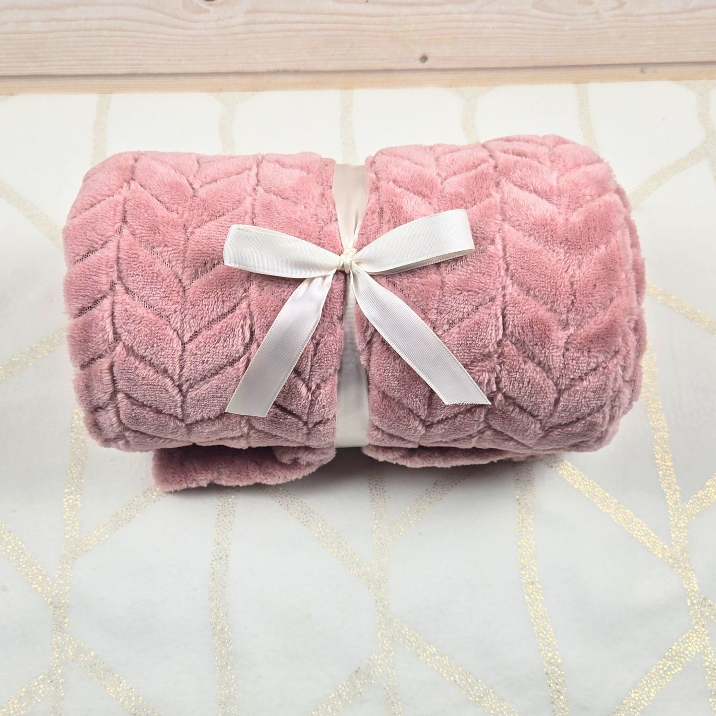 Pink throw for gift box for her.