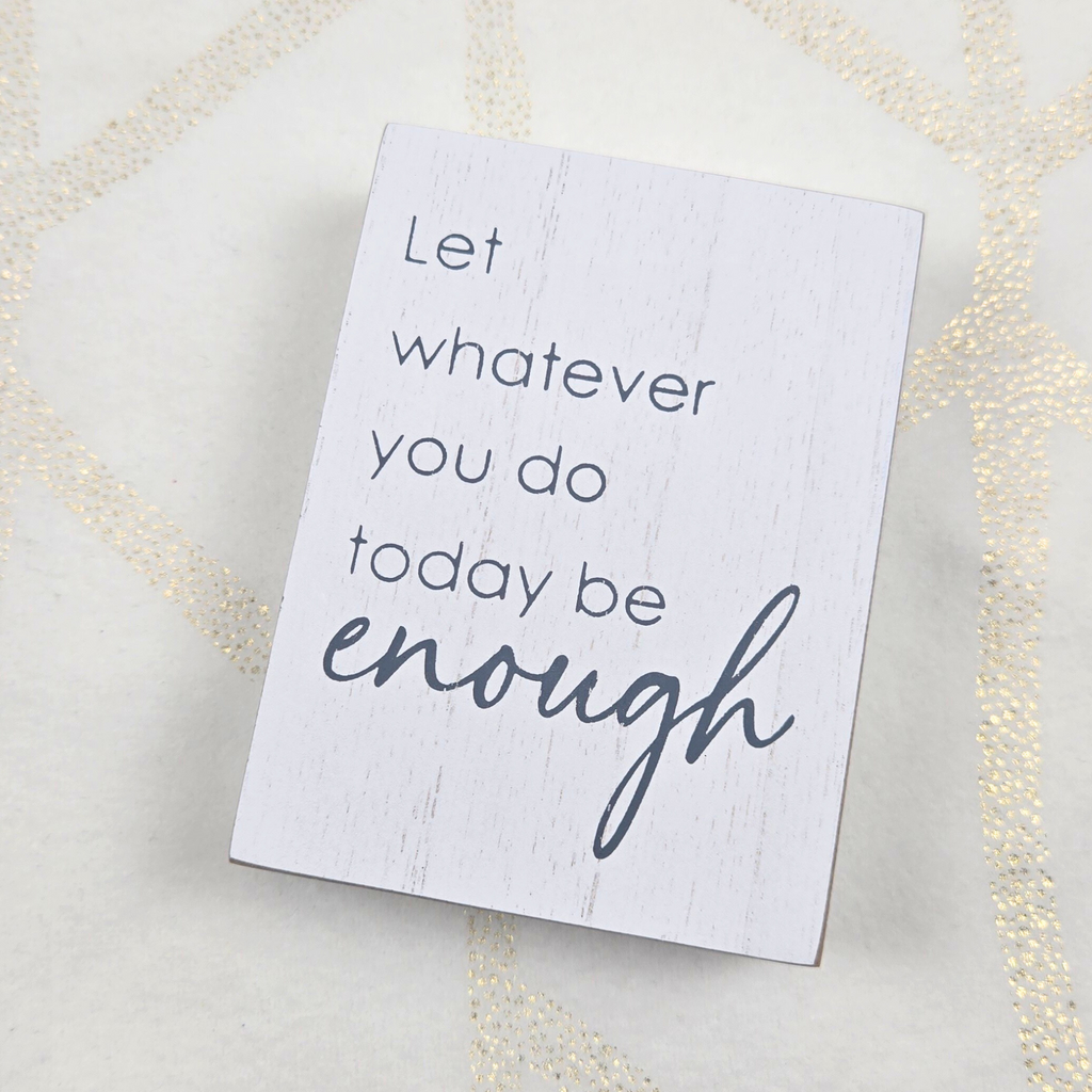 Decor stating, "Let whatever you do today be enough."