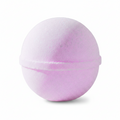 A round, bath bomb in a light pinkish-purple color, shown against a plain white background.
