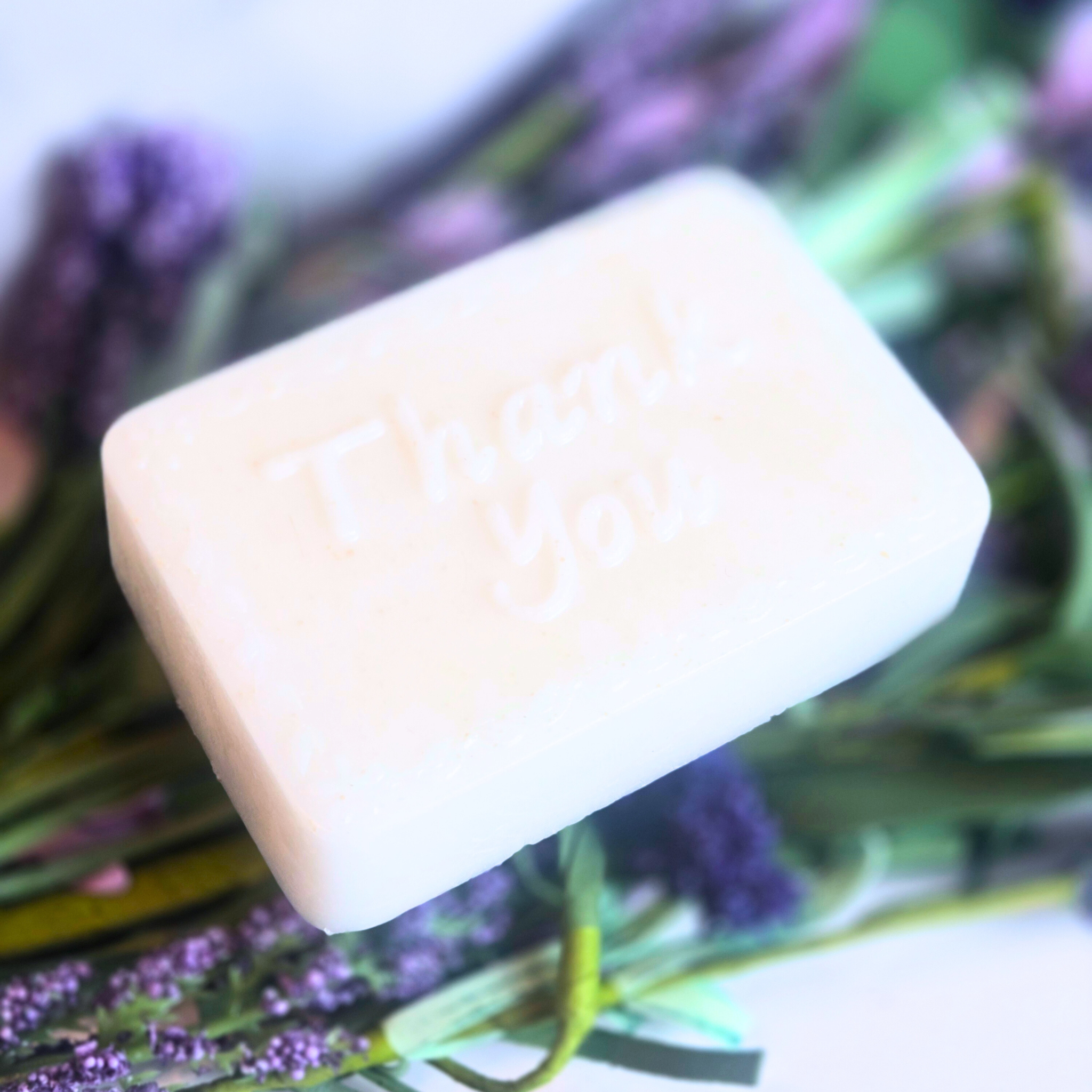 Lavender-scented soap with white kaolin clay, styled for wedding gift table, side view.