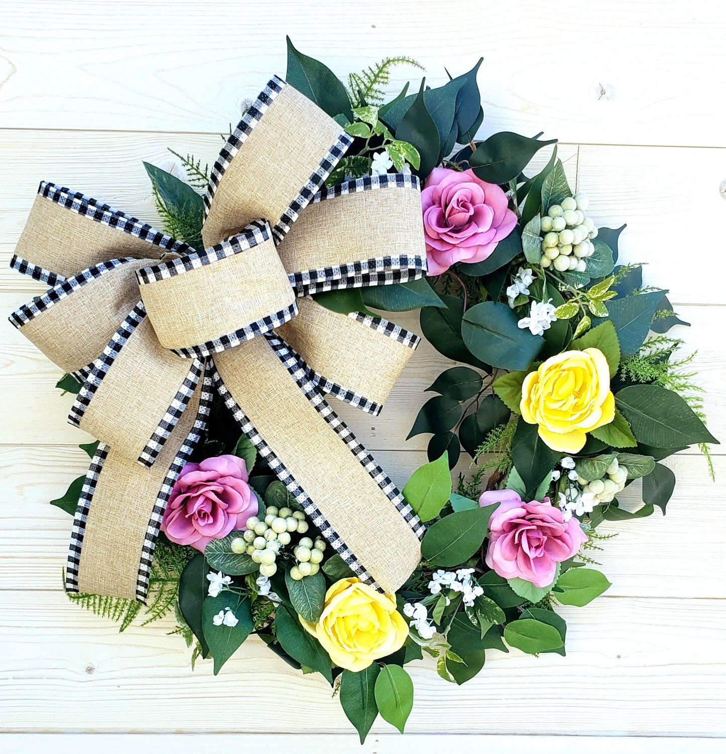 Farmhouse Faux Floral Wreath with Checkered Burlap Bow, front view.